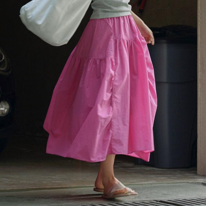 Summer elastic waist, lightweight and breathable half length long skirt for women in pink, perfect for warm days.