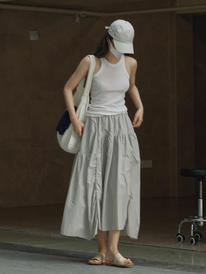 Stylish Summer elastic waist, lightweight and breathable half length long skirt for women, perfect for warm days.
