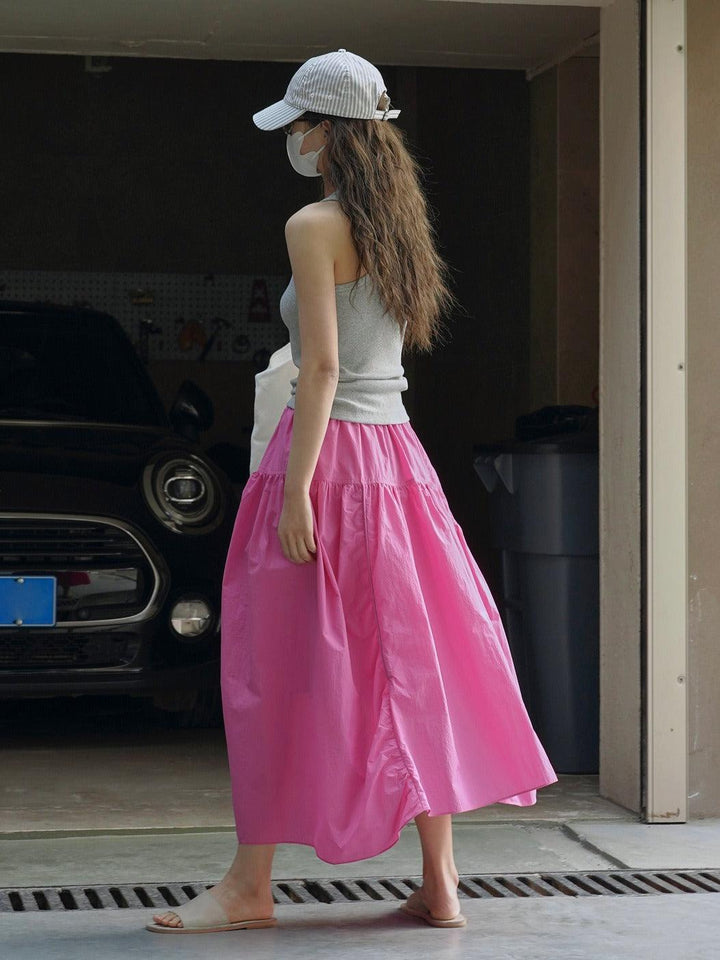 Summer elastic waist, lightweight and breathable half length long skirt for women in pink, perfect for casual outings.