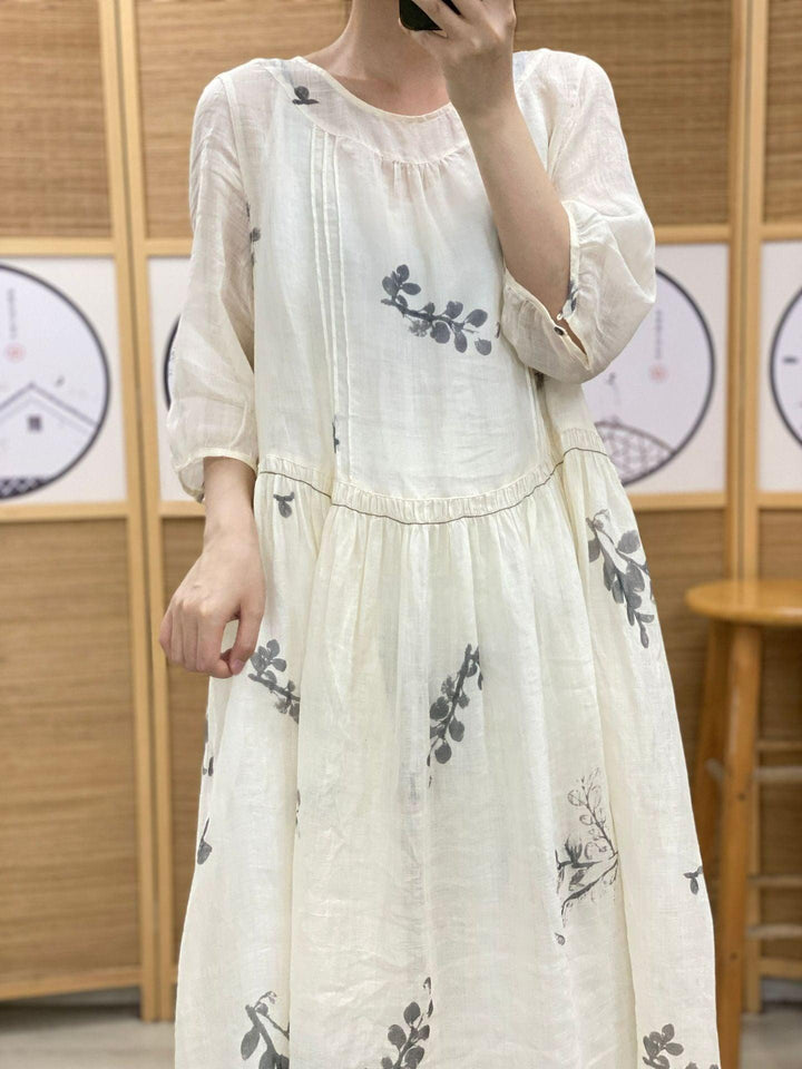 Plus Size Women's Ramie Summer Print Dress features a white, mid-length design with a round neck and half sleeves.