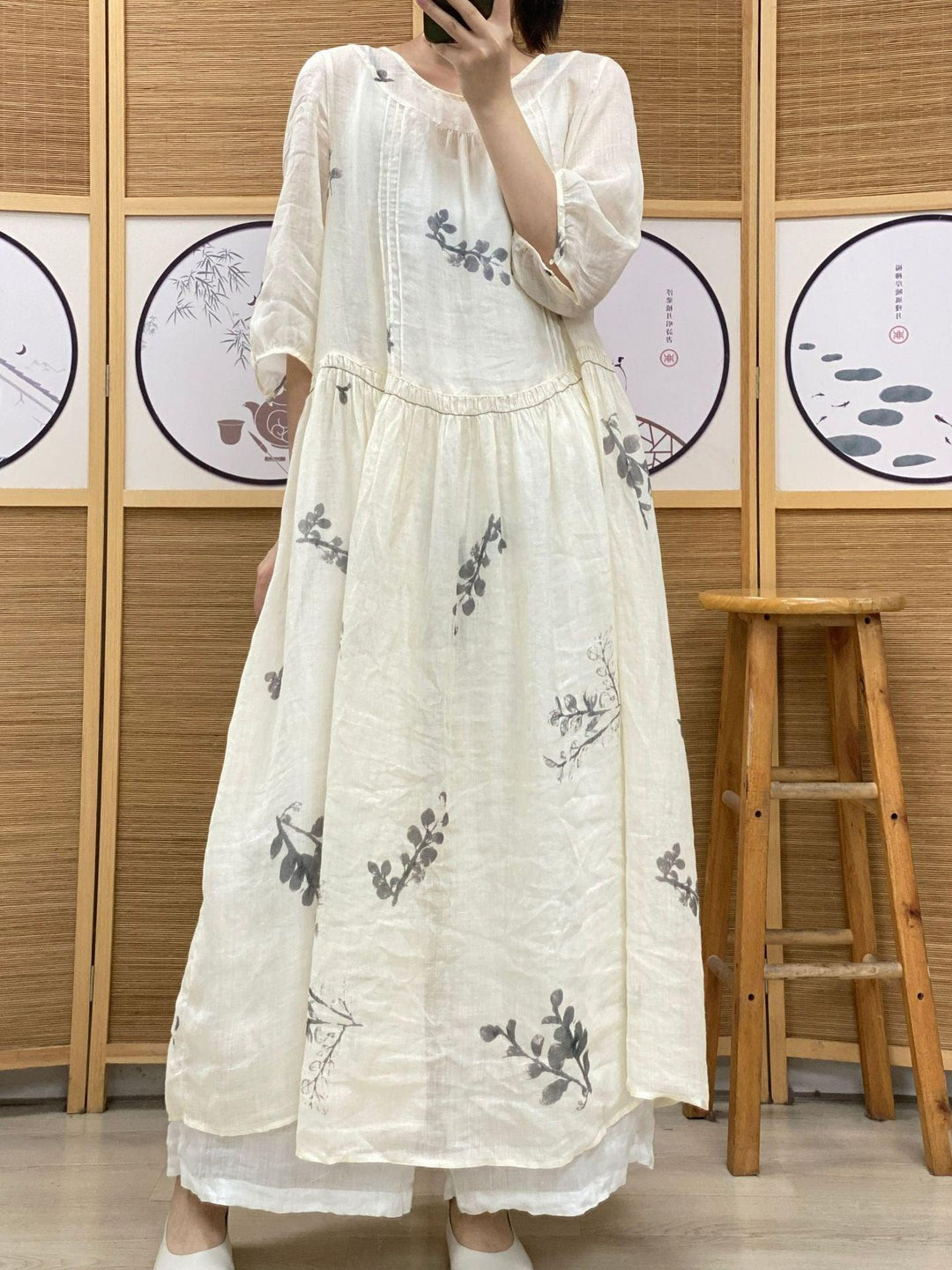 Plus Size Women's Ramie Summer Print Dress features a lightweight design with a round neck and half sleeves in a chic white.