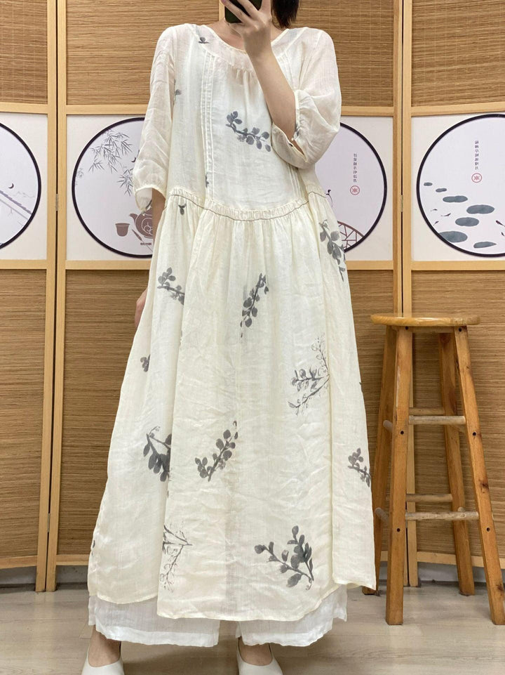 Plus Size Women's Ramie Summer Print Dress features a lightweight design with a round neck and half sleeves in a chic white.