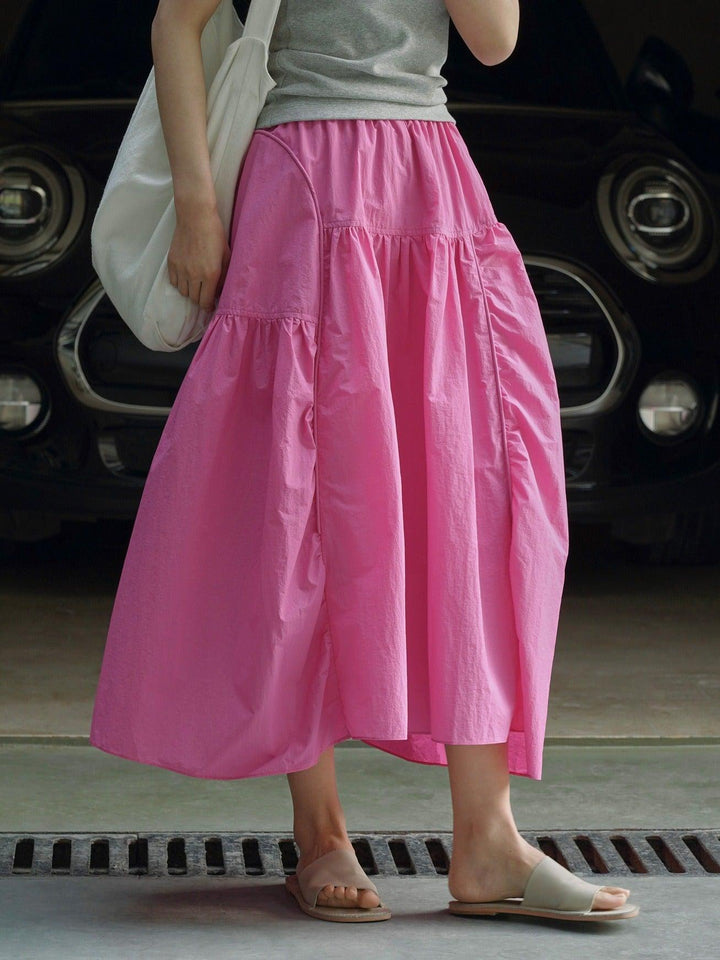 Stylish pink A-line skirt featuring a summer elastic waist, lightweight and breathable for women’s comfort.