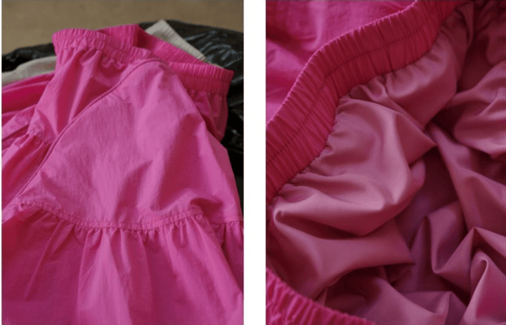 Summer elastic waist, lightweight and breathable half length long skirt for women in vibrant pink, perfect for warm days.