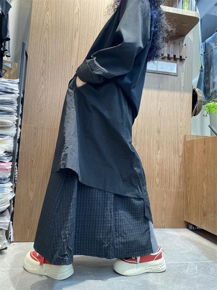 Stylish women's irregular skirt pants with pockets in black, perfect for casual commuting and comfortable wear.